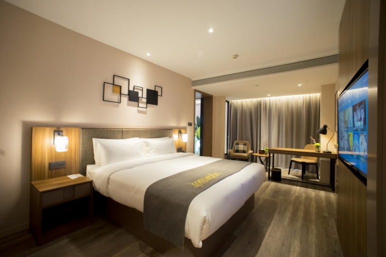 首旅如家创新推出“暖心房” 以连住优惠与会议空间共享，双轮驱动文旅市场复苏